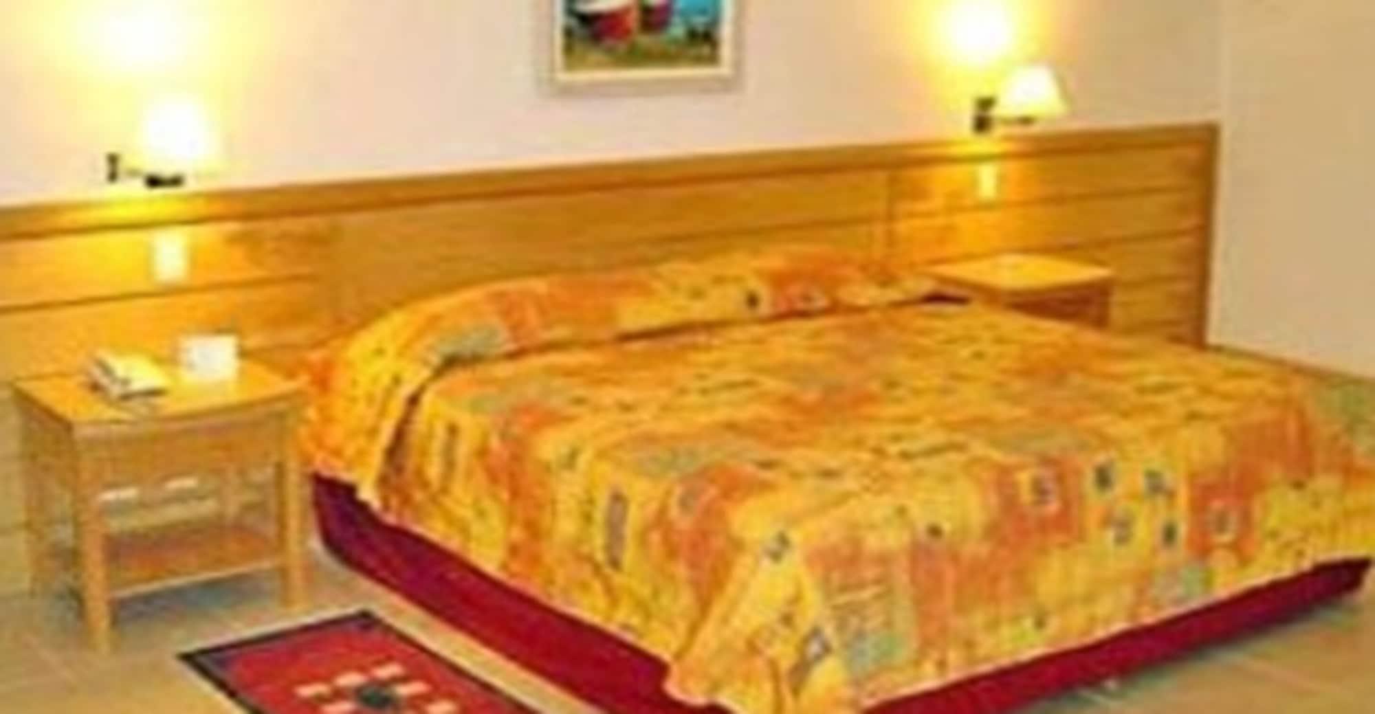 Hotel Atlântico Búzios Convention Esterno foto A bed