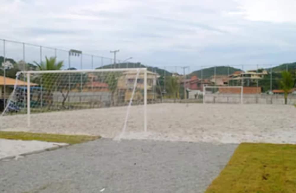 Hotel Atlântico Búzios Convention Esterno foto A sand football field in Rio de Janeiro.