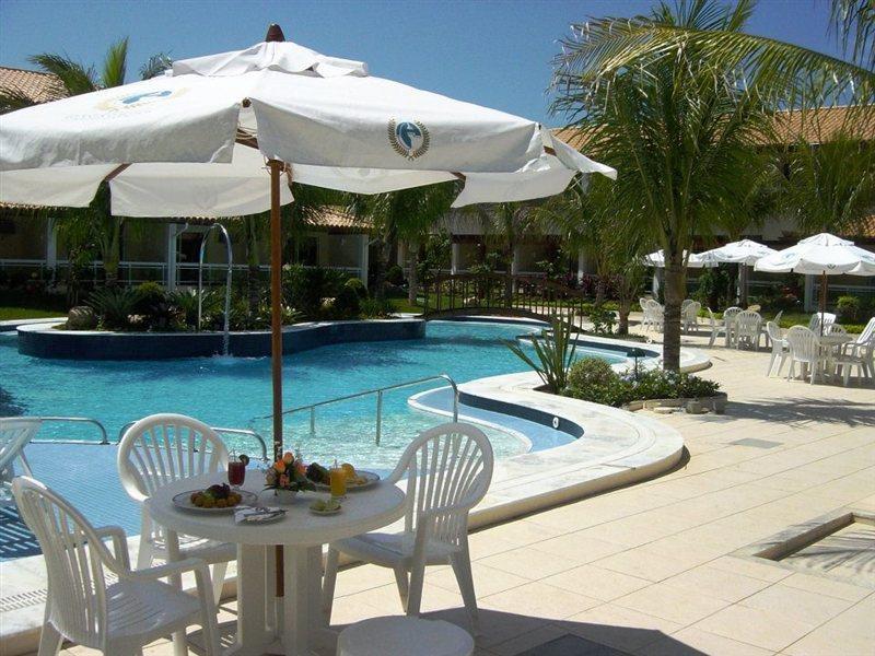 Hotel Atlântico Búzios Convention Esterno foto A pool in a resort in Brazil