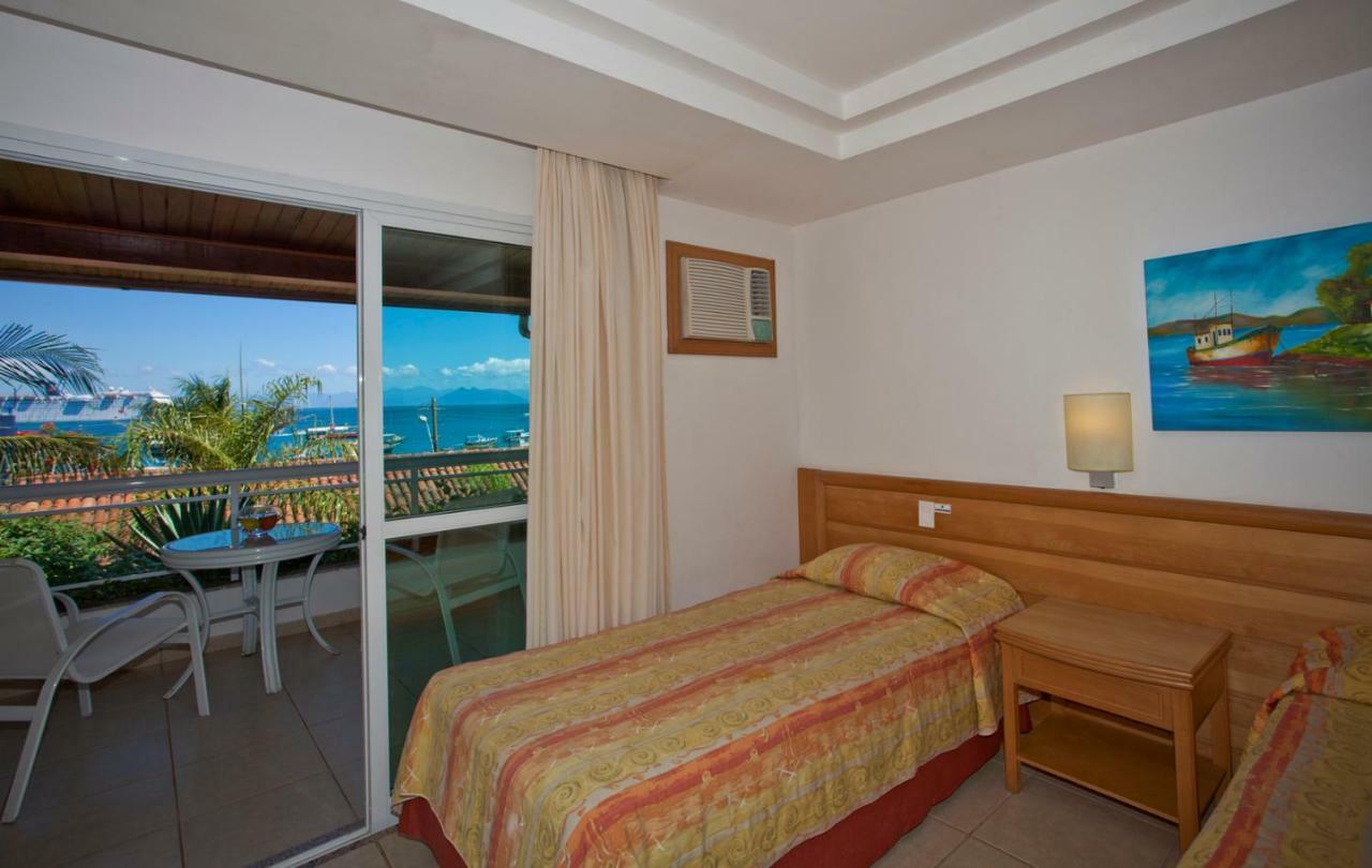 Hotel Atlântico Búzios Convention Esterno foto A single bed